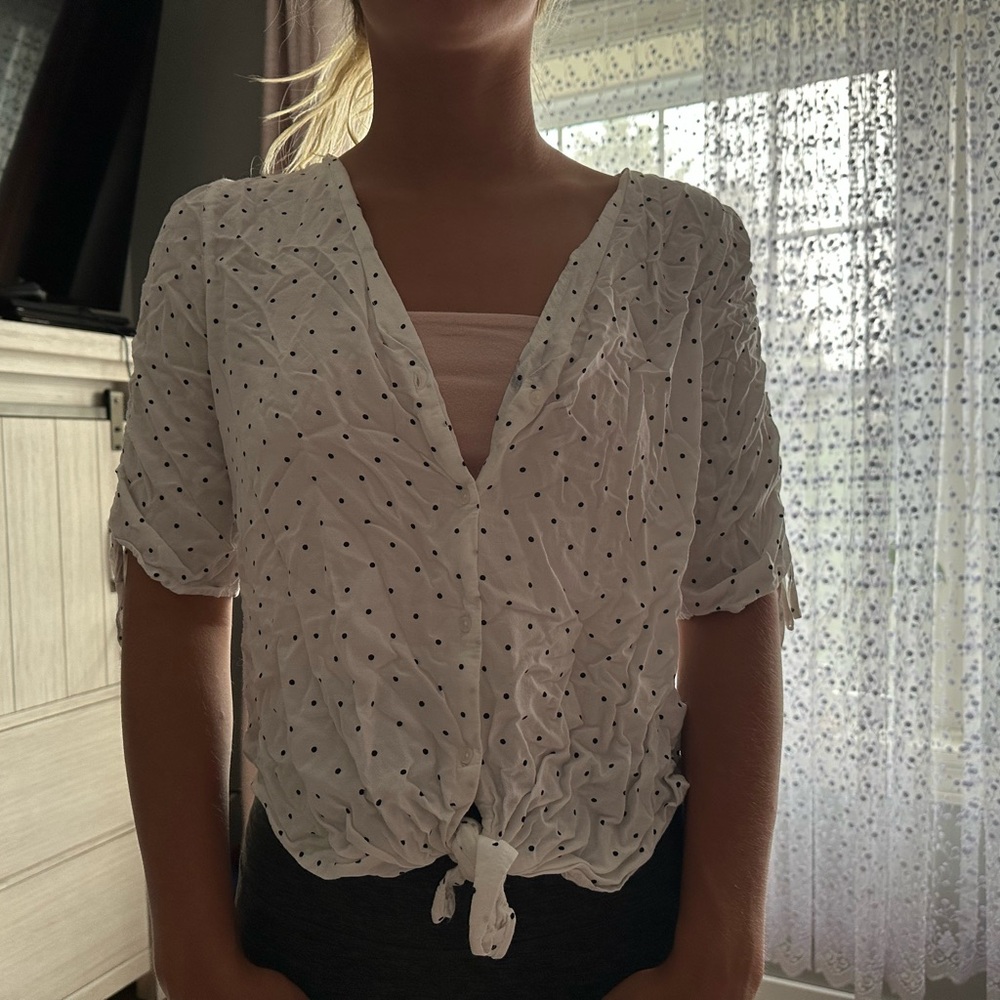White polka dot blouse